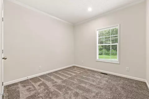 Bedroom - 211 Old North Carolina 75, Stem, NC 27581 photo 2 of 4
