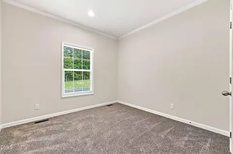 Bedroom - 211 Old North Carolina 75, Stem, NC 27581 photo 4 of 4