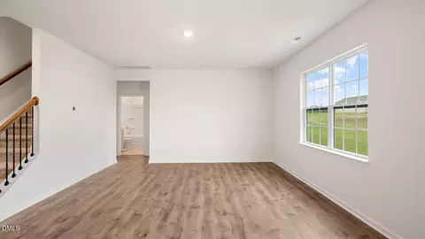Living - 1017 Cattle Dr, Wake Forest, NC 27587 photo 2 of 3