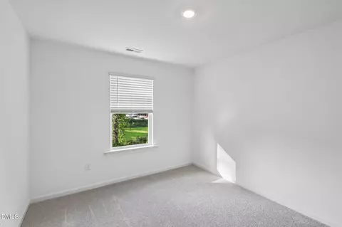 Bedroom - 500 Oak Reserve Dr #103, Garner, NC 27529 photo 6 of 7