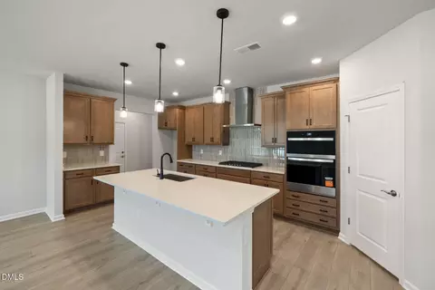 Kitchen - 3004 Denson Rd, Willow Spring, NC 27592 photo 3 of 4