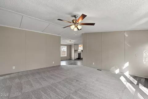 Living - 100 E Abbey Ct, Smithfield, NC 27577 photo 2 of 5