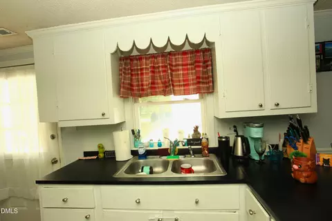 Kitchen - 2351 Mount Pleasant Rd, Willow Spring, NC 27592 photo 4 of 5