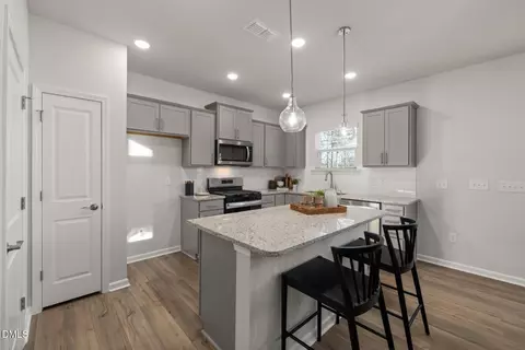 Kitchen - 216 Armorial Ct, Willow Spring, NC 27592 photo 2 of 3