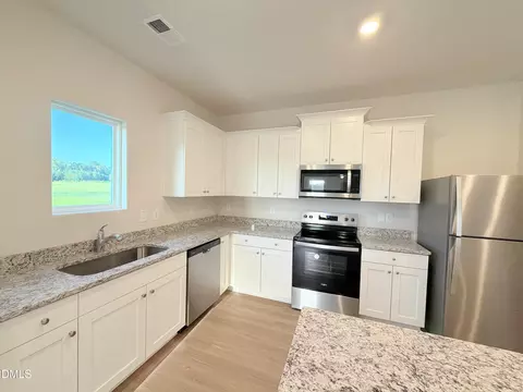 Kitchen - 11430 International Dr, Middlesex, NC 27557 photo 2 of 3