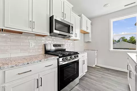 Kitchen - 34 Baird Cv Ln, Angier, NC 27501 photo 3 of 4