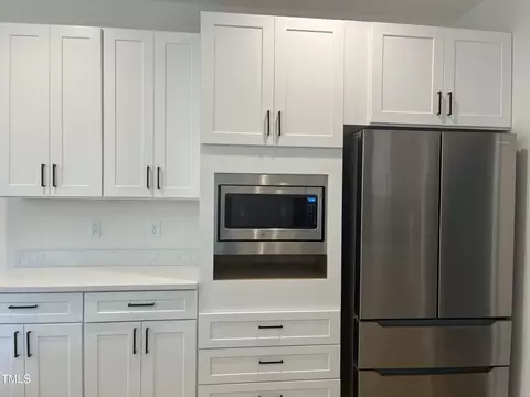 Kitchen - 313 W Cornwallis Rd, Durham, NC 27707 photo 7 of 9