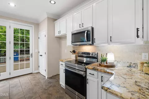Kitchen - 711 Midsummer Ln, Apex, NC 27502 photo 9 of 10
