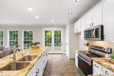 Kitchen - 711 Midsummer Ln, Apex, NC 27502 photo 8 of 10