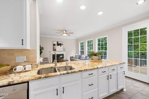Kitchen - 711 Midsummer Ln, Apex, NC 27502 photo 7 of 10