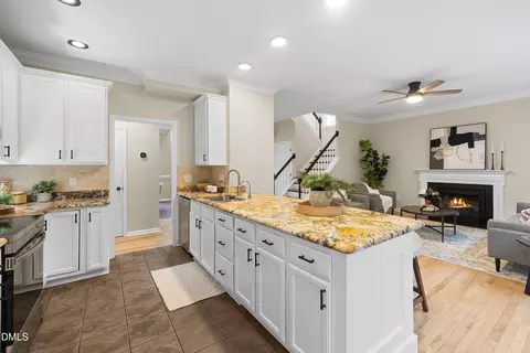 Kitchen - 711 Midsummer Ln, Apex, NC 27502 photo 5 of 10