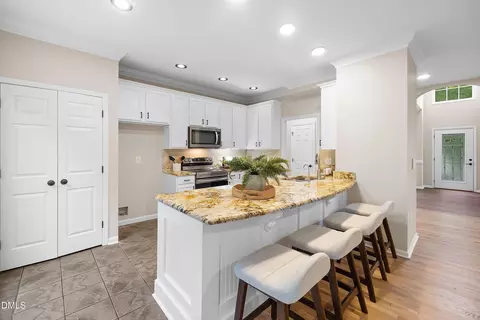 Kitchen - 711 Midsummer Ln, Apex, NC 27502 photo 4 of 10