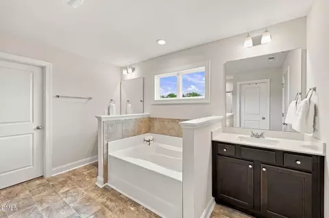 Bath - 79 Pleasant Grove Ct, Willow Spring, NC 27592 photo 3 of 6