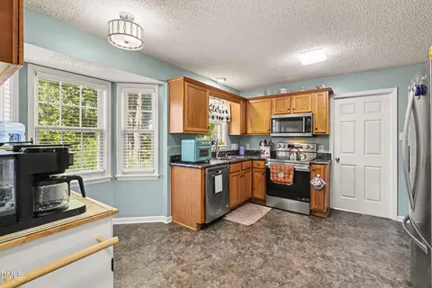 Kitchen - 105 Huckleberry Ct, Willow Spring, NC 27592 photo 6 of 6