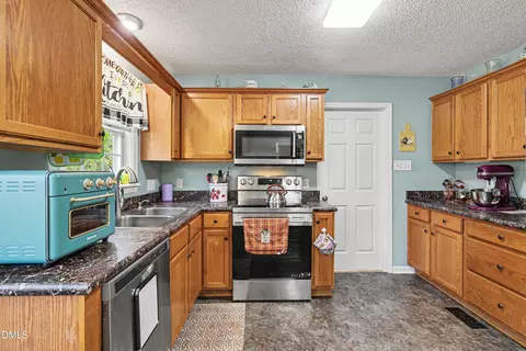 Kitchen - 105 Huckleberry Ct, Willow Spring, NC 27592 photo 2 of 6