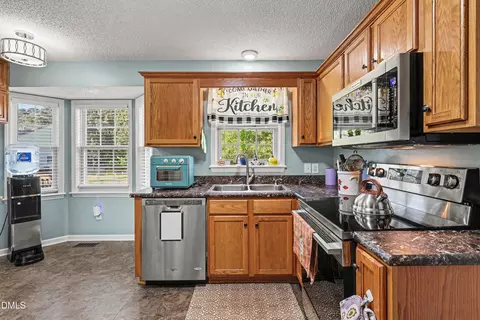 Kitchen - 105 Huckleberry Ct, Willow Spring, NC 27592 photo 3 of 6