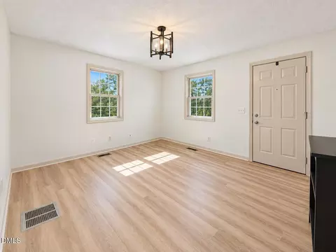 Living - 5945 Craig Rd, Durham, NC 27712 photo 3 of 4