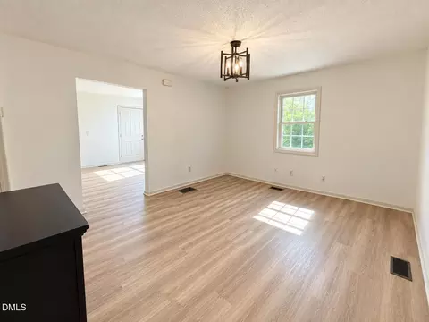 Living - 5945 Craig Rd, Durham, NC 27712 photo 2 of 4