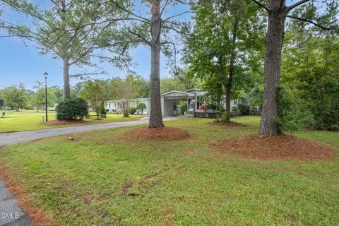 Exterior - 160 Champion Dr, Hampstead, NC 28443 photo 4 of 12