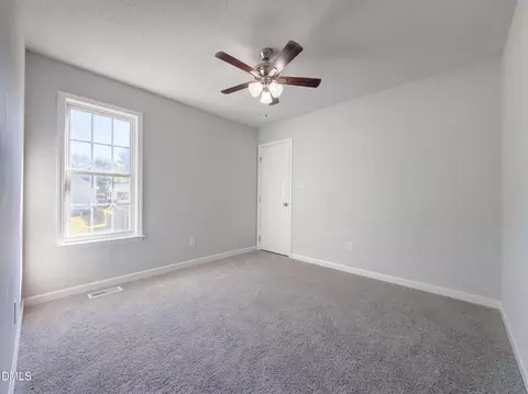 Bedroom - 1713 Tall Cane Cir, Willow Spring, NC 27592 photo 2 of 3