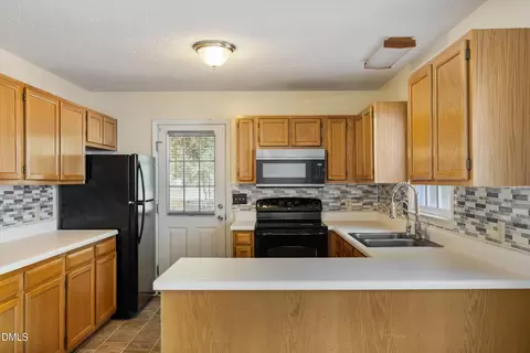 Kitchen - 46 Circle Tree Ln, Angier, NC 27501 photo 2 of 7