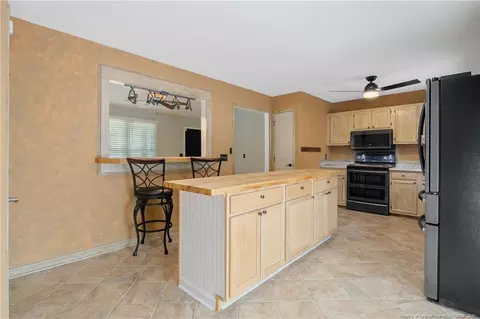 Kitchen - 237 Lemuel Black Rd, Bunnlevel, NC 28323 photo 7 of 7