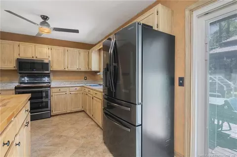 Kitchen - 237 Lemuel Black Rd, Bunnlevel, NC 28323 photo 6 of 7