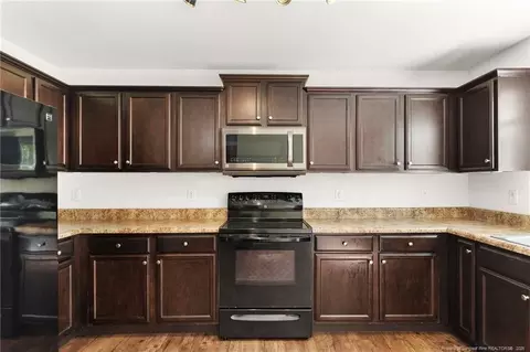 Kitchen - 422 Botanical Ct, Bunnlevel, NC 28323 photo 2 of 4