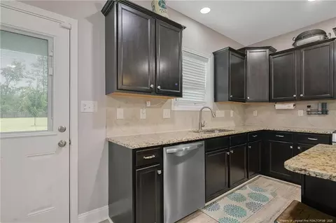 Kitchen - 1074 Saint Johns Loop, Raeford, NC 28376 photo 3 of 4