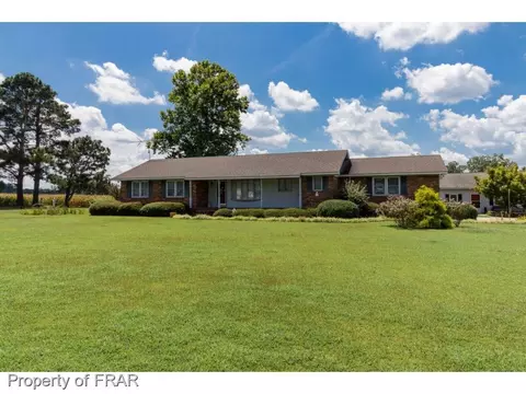 1042 Barnes Rd, Orrum, NC 28369 photo 1