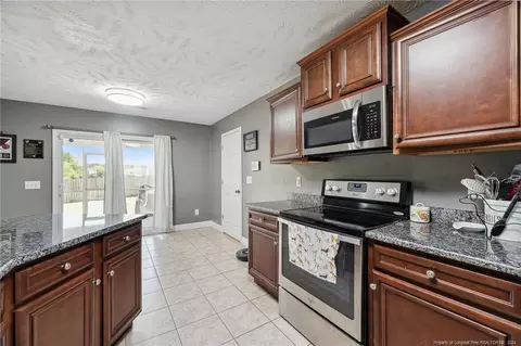 Kitchen - 176 Vandercroft Way, Bunnlevel, NC 28323 photo 4 of 4