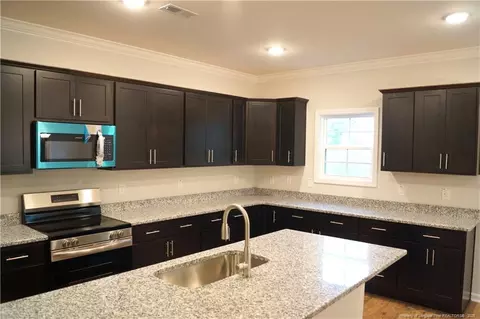 Kitchen - 123 Nectar Ln, Bunnlevel, NC 28323 photo 9 of 12