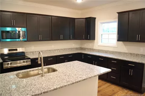 Kitchen - 123 Nectar Ln, Bunnlevel, NC 28323 photo 3 of 12