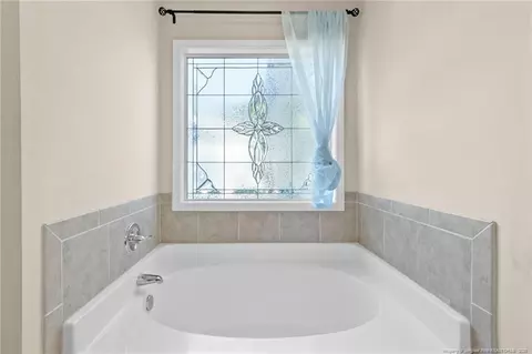 Bath - 696 Valley Oak Dr, Bunnlevel, NC 28323 photo 3 of 5