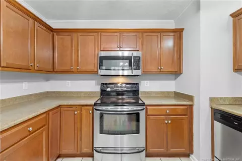 Kitchen - 812 Raspberry Rd, Stedman, NC 28391 photo 2 of 3