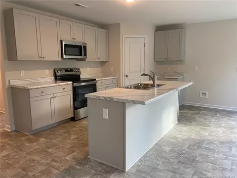Kitchen - 32 Pointer Way, Parkton, NC 28371 photo 2 of 2