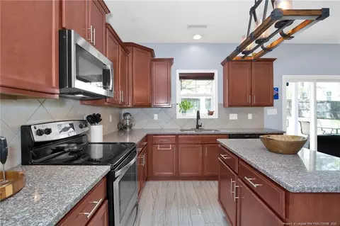 Kitchen - 148 Huzzas Cir, Cameron, NC 28326 photo 3 of 5
