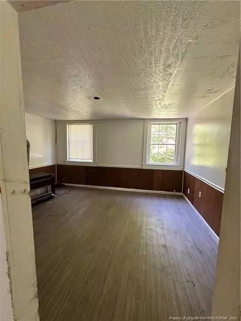 Living - 410 W K St, Erwin, NC 28339 photo 2 of 2