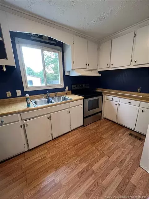 Kitchen - 216 E Stack St, Saint Pauls, NC 28384 photo 2 of 2