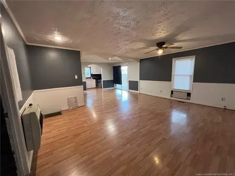 Living - 216 E Stack St, Saint Pauls, NC 28384 photo 4 of 4