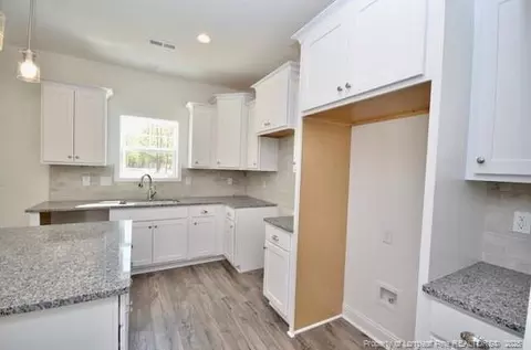 Kitchen - 2885 Lemuel Black Rd, Bunnlevel, NC 28323 photo 3 of 4