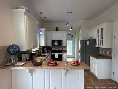 Kitchen - 28 Maple Ave, White Lake, NC 28337 photo 2 of 3