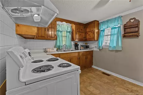 Kitchen - 3042 Overhills Rd, Bunnlevel, NC 28323 photo 2 of 3