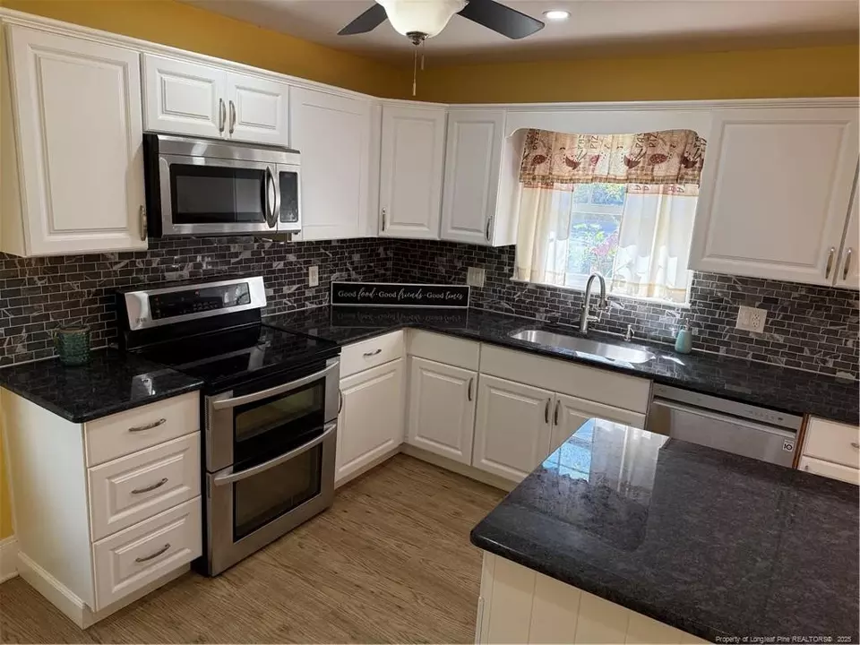 Kitchen - 210 W Elwood Ave, Raeford, NC 28376 photo 1 of 2