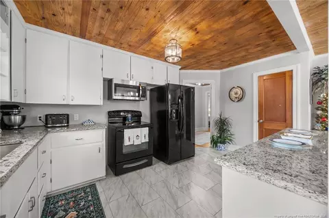 Kitchen - 1752 Lee Johnson Dr, Dunn, NC 28334 photo 2 of 3