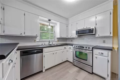 Kitchen - 400 1st St, Broadway, NC 27505 photo 2 of 4