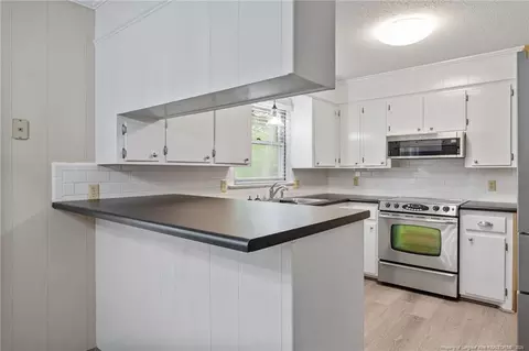 Kitchen - 400 1st St, Broadway, NC 27505 photo 1 of 4