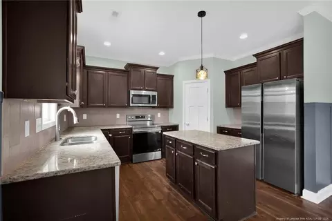 Kitchen - 145 Blue Chip Ct, Broadway, NC 27505 photo 3 of 4