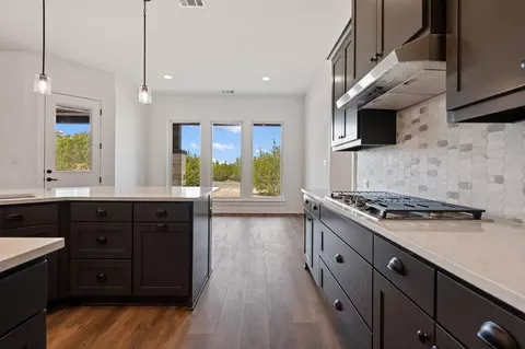 Kitchen - 134 Whispering Wind Rd, Bertram, TX 78605 photo 2 of 5