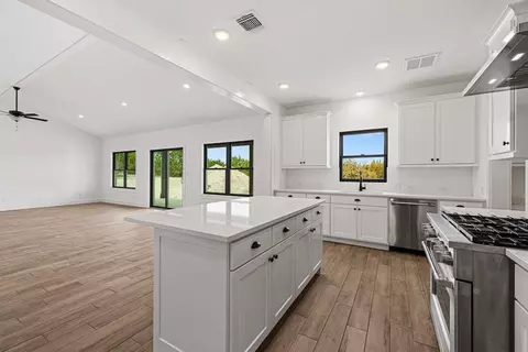 Kitchen - 150 Whispering Wind Rd, Bertram, TX 78605 photo 3 of 5